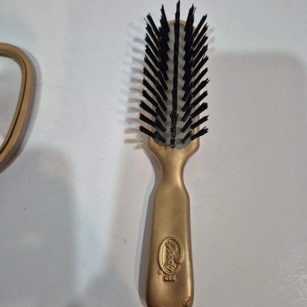 Gold Goody Brush, Comb, & Mirror. Finish is peeling/flaking off.